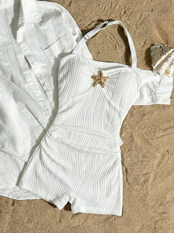 Apricot one-piece swimsuit for tween girls with a halter neckline, ruffle trim, textured knit fabric, fitted shape, and starfish metal decor.