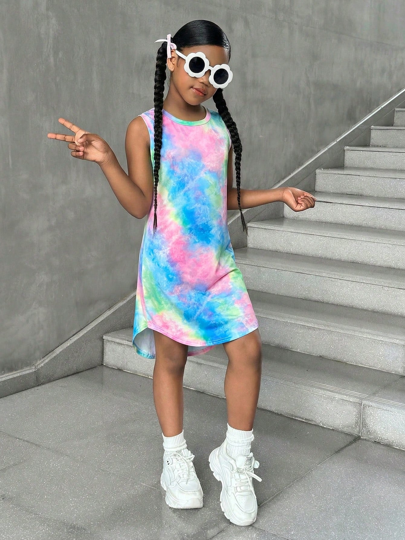 Tween girls sleeveless tie-dye tank dress with round neck, loose fit, short length, and asymmetrical hem in a casual streetwear style