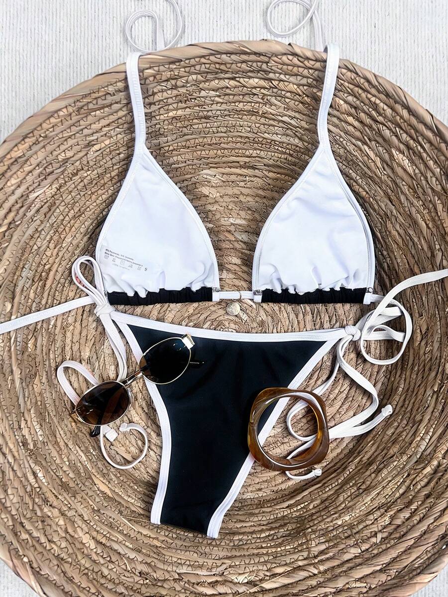 Women's high waist 2-piece triangle bikini set featuring colorblock trim, halter neckline, wireless bra with removable padding, and tie-side bottoms.