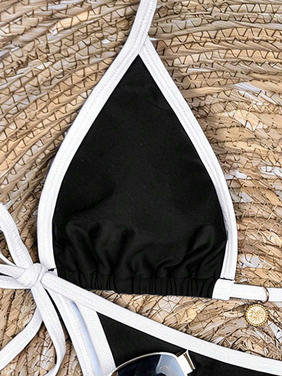 Women's high waist 2-piece triangle bikini set featuring colorblock trim, halter neckline, wireless bra with removable padding, and tie-side bottoms.