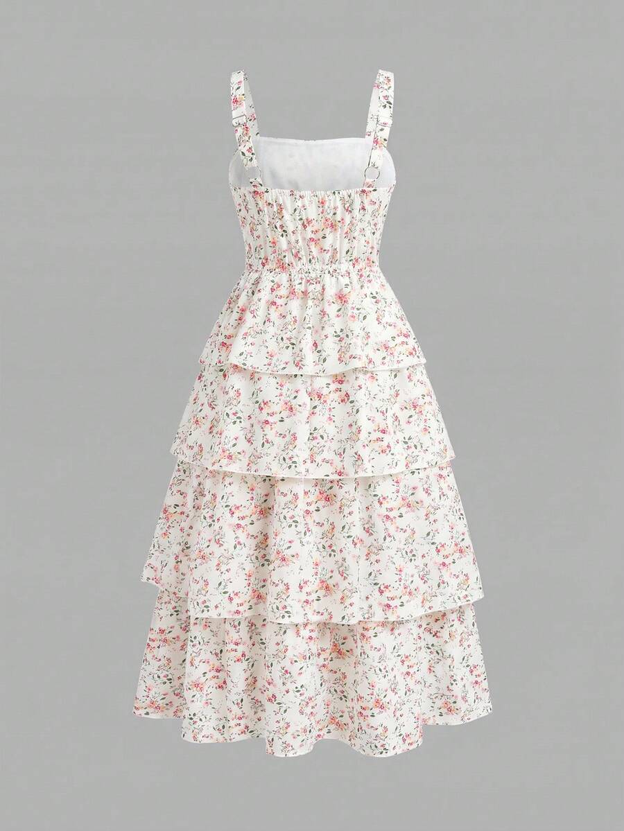 Tween girls blue ditsy floral sleeveless long dress with spaghetti straps, ruched bust, high waist, and tiered layered hem.