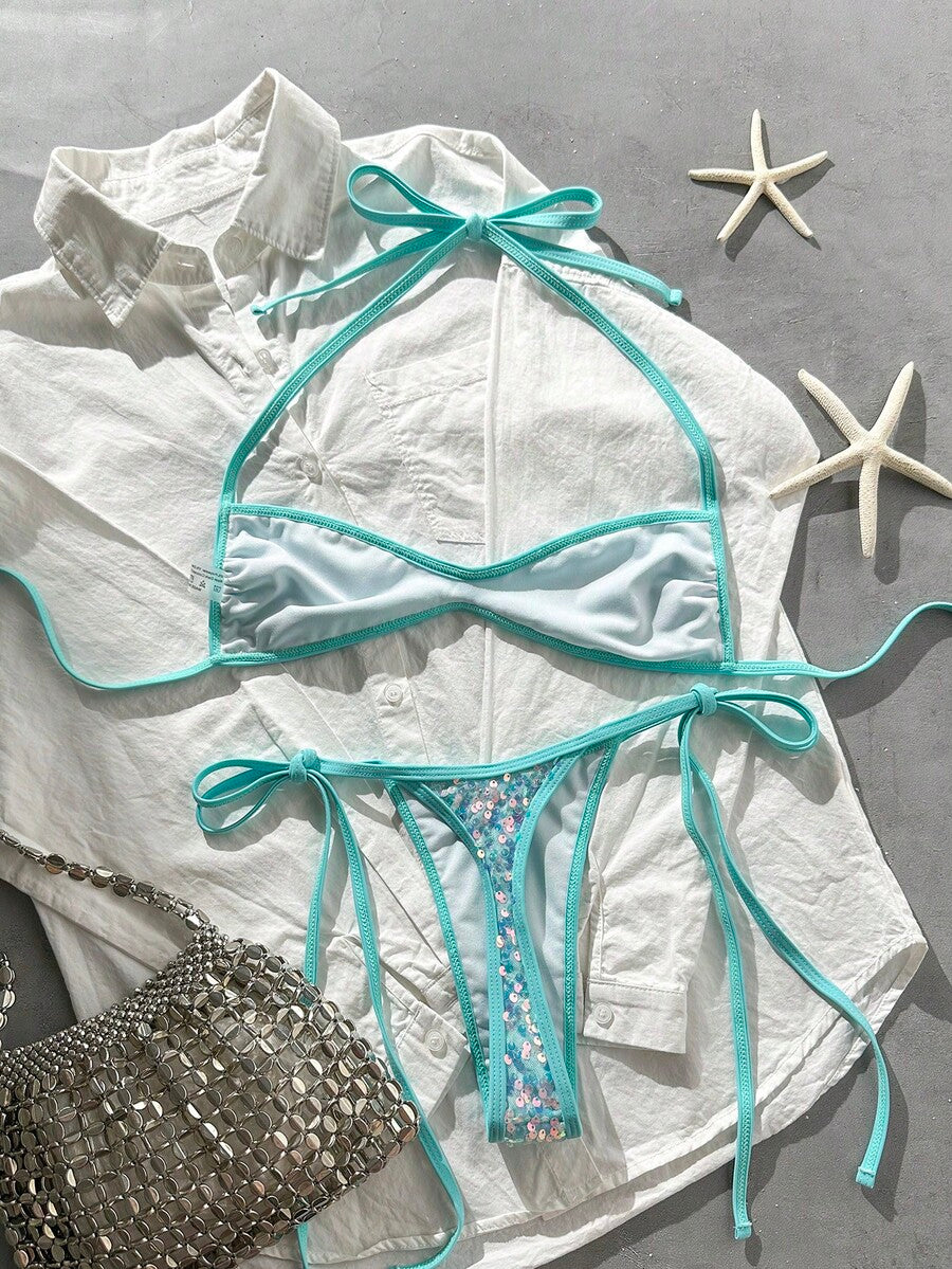 Apricot 2-piece sequin textured halter bikini set featuring a wireless top with lace-up backless ties and matching low-waist side-tie thong bottoms.