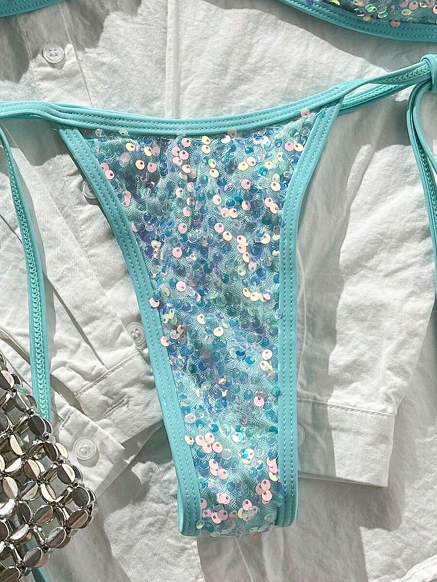 Apricot 2-piece sequin textured halter bikini set featuring a wireless top with lace-up backless ties and matching low-waist side-tie thong bottoms.