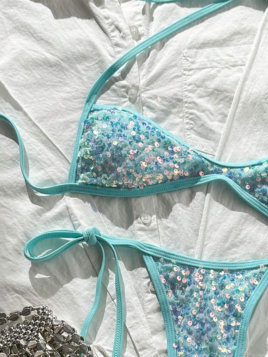 Apricot 2-piece sequin textured halter bikini set featuring a wireless top with lace-up backless ties and matching low-waist side-tie thong bottoms.