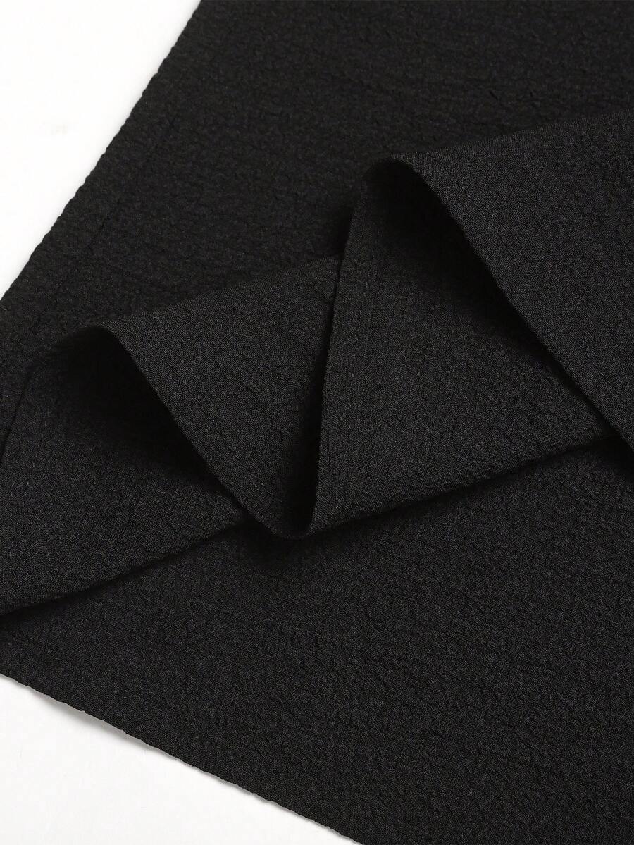 Tween girls casual black A-line long dress featuring short sleeves, a round neckline, and a decorative front bow with contrast lace trim.