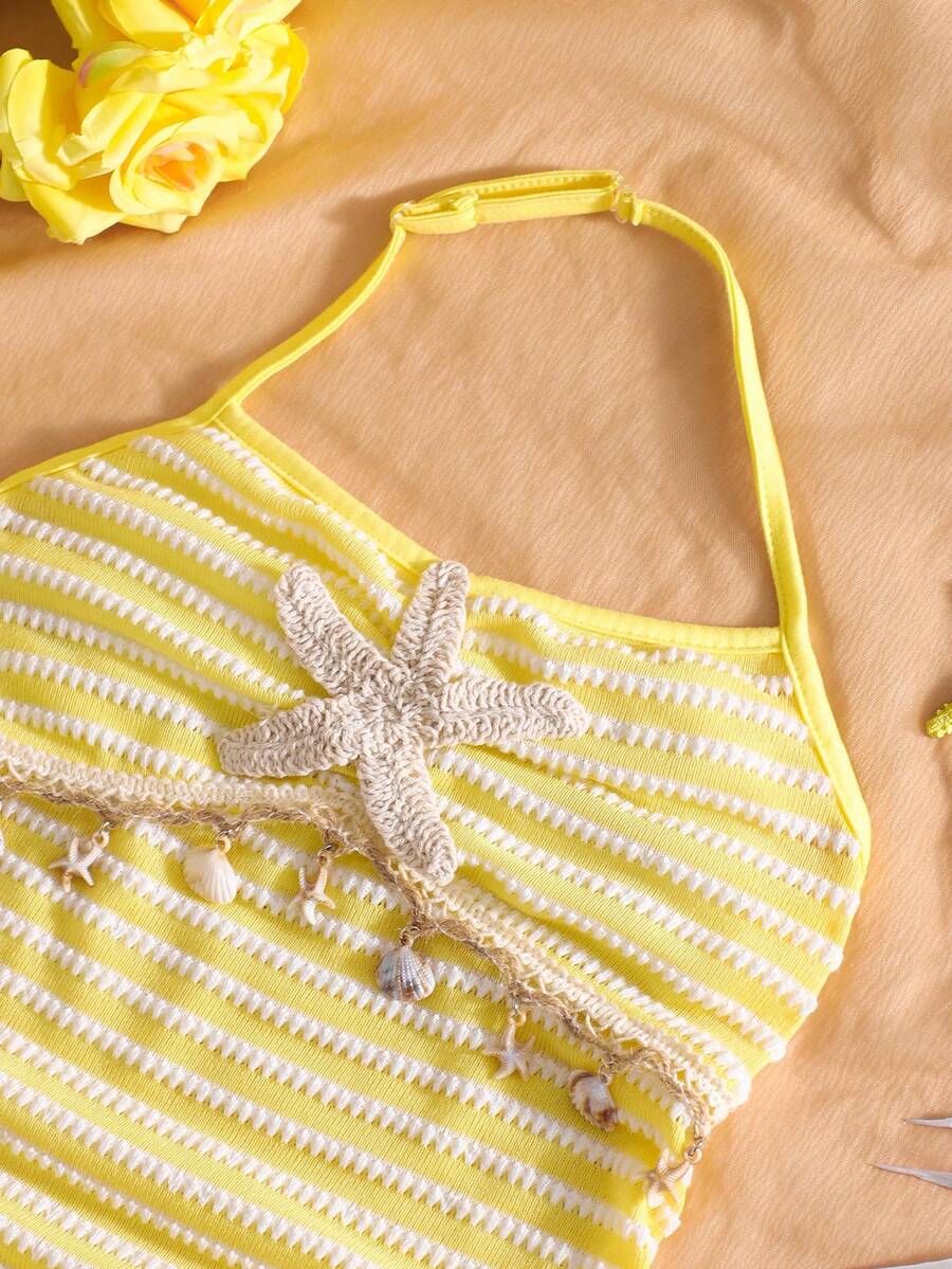 Tween girls apricot sleeveless halter mini dress with textured starfish and shell decor, shirred tiered layer, high waist, and flounce hem.