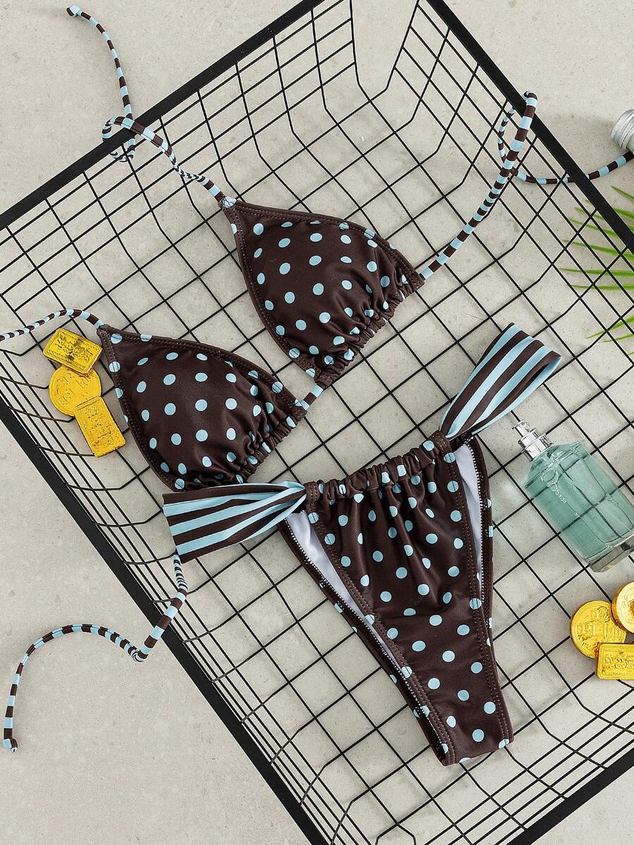 Women's striped halter two-piece swimsuit featuring a lace-up triangle top with removable padding and high-cut low-waist bikini bottoms.