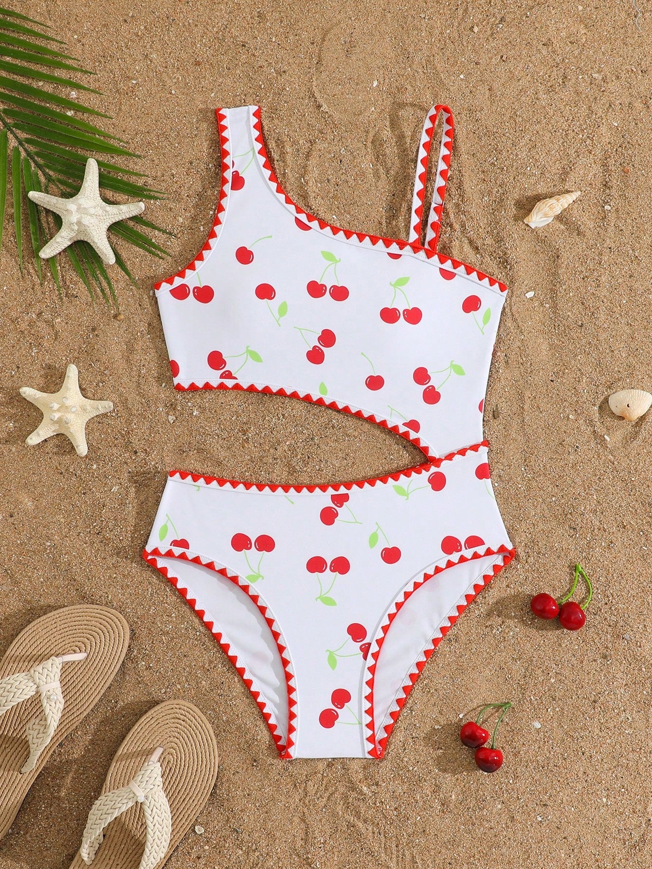 Tween girls one-piece swimsuit featuring an asymmetric neckline, pendant decor, plain design, wireless bra, high-cut bottom, and medium-stretch fabric.