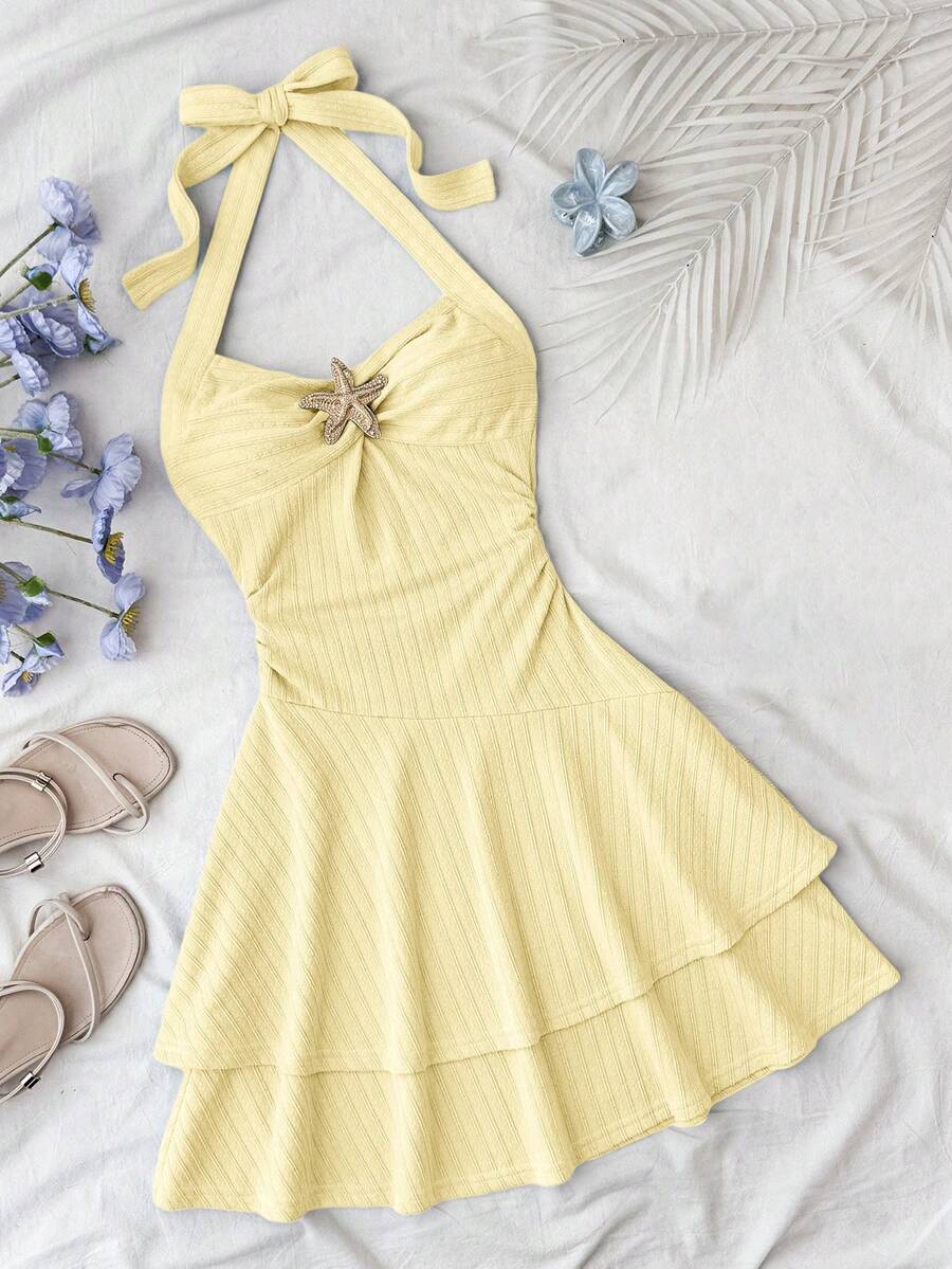 Tween girl summer dress in blue with striped pattern, halter neckline, tie front, sleeveless slim fit, high waist, and tiered ruffle hem for beach vacation and casual holiday wear.