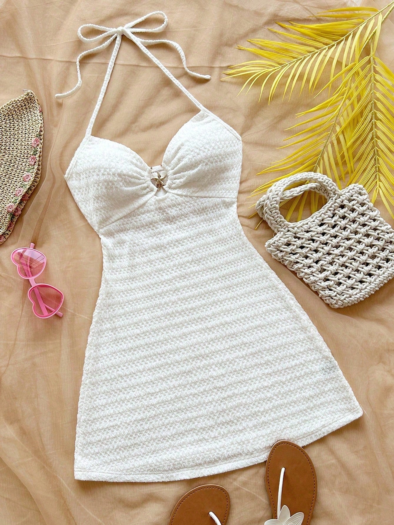 Apricot tween girls sleeveless halter cami dress with appliques, bow front, zipper detail, high waist, flared hem, and short slim fit design.