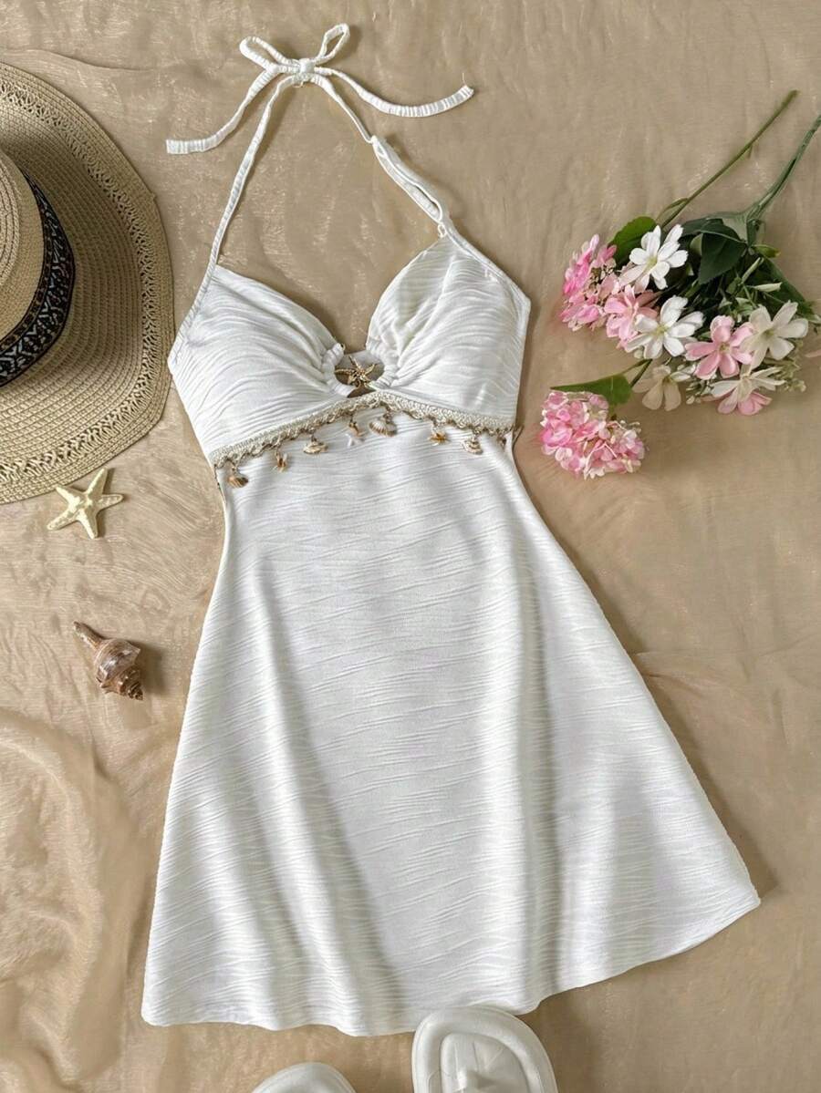 Tween girls blue sleeveless cami dress with spaghetti straps, ruched bust, short slim fit, and vacation-ready style