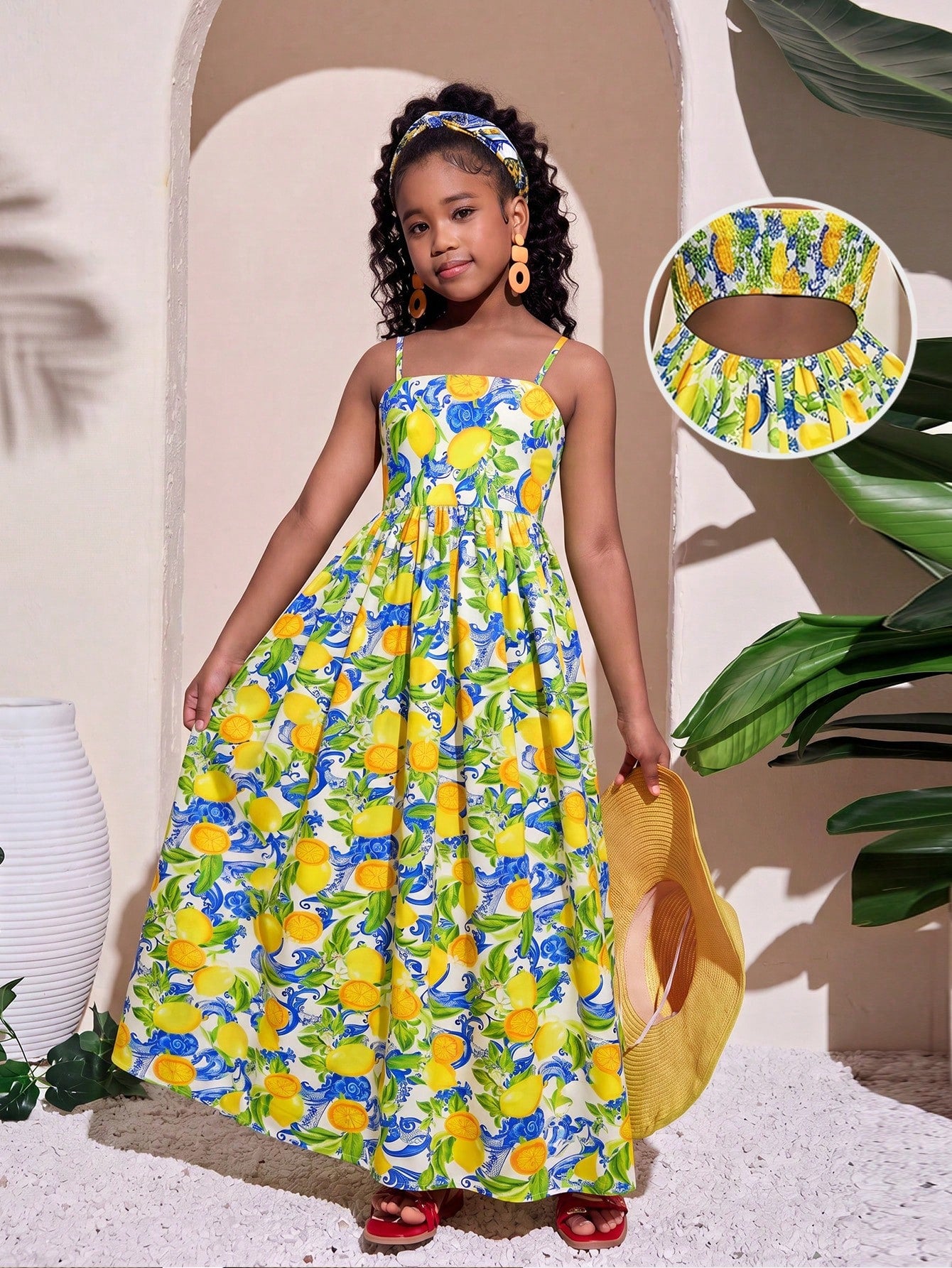 Tween girls striped spaghetti strap cami dress with high waist, shirred detail, zipper closure, sleeveless design, and flared long A-line silhouette for vacation wear.