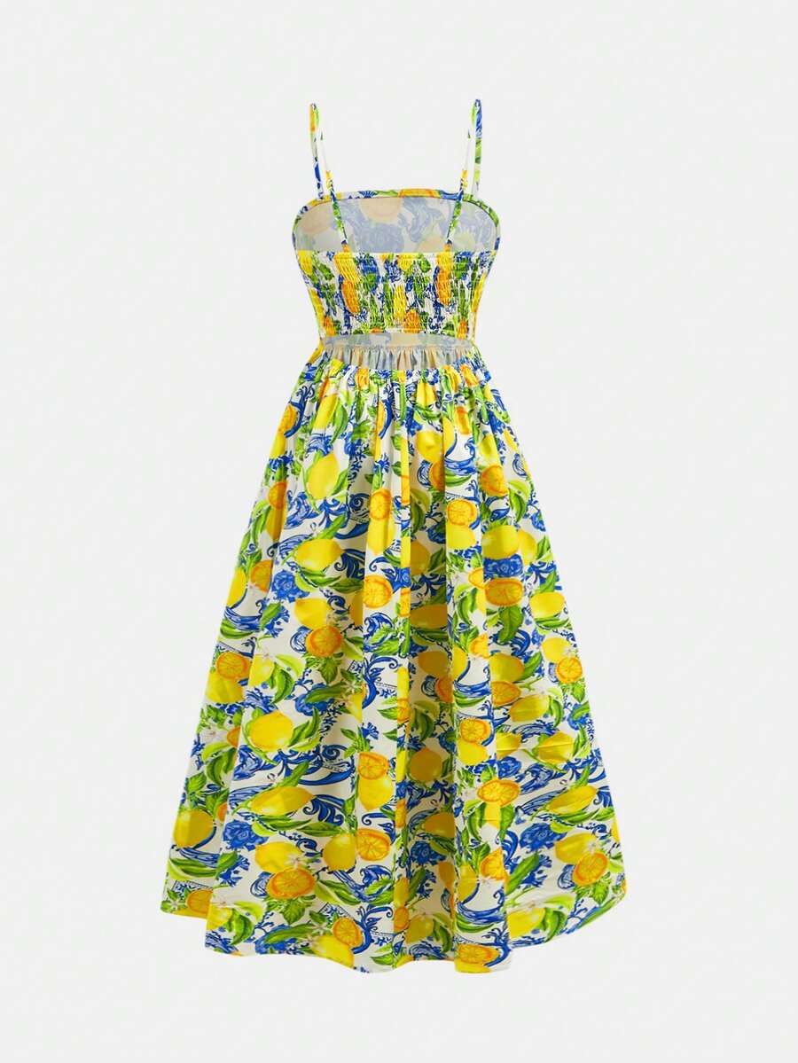 Tween girls blue striped summer camisole dress featuring spaghetti straps, high waist, flared hem, and back zipper detail.