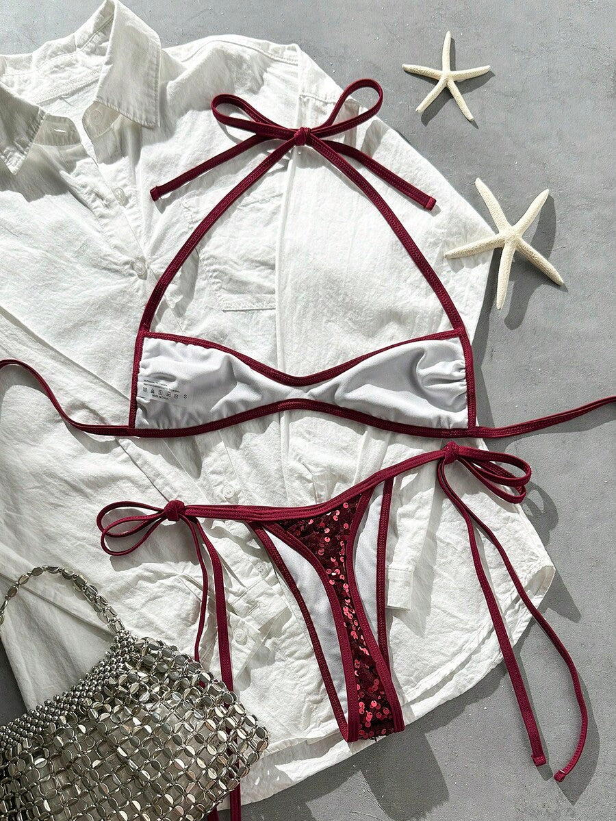 Apricot 2-piece sequin textured halter bikini set featuring a wireless top with lace-up backless ties and matching low-waist side-tie thong bottoms.