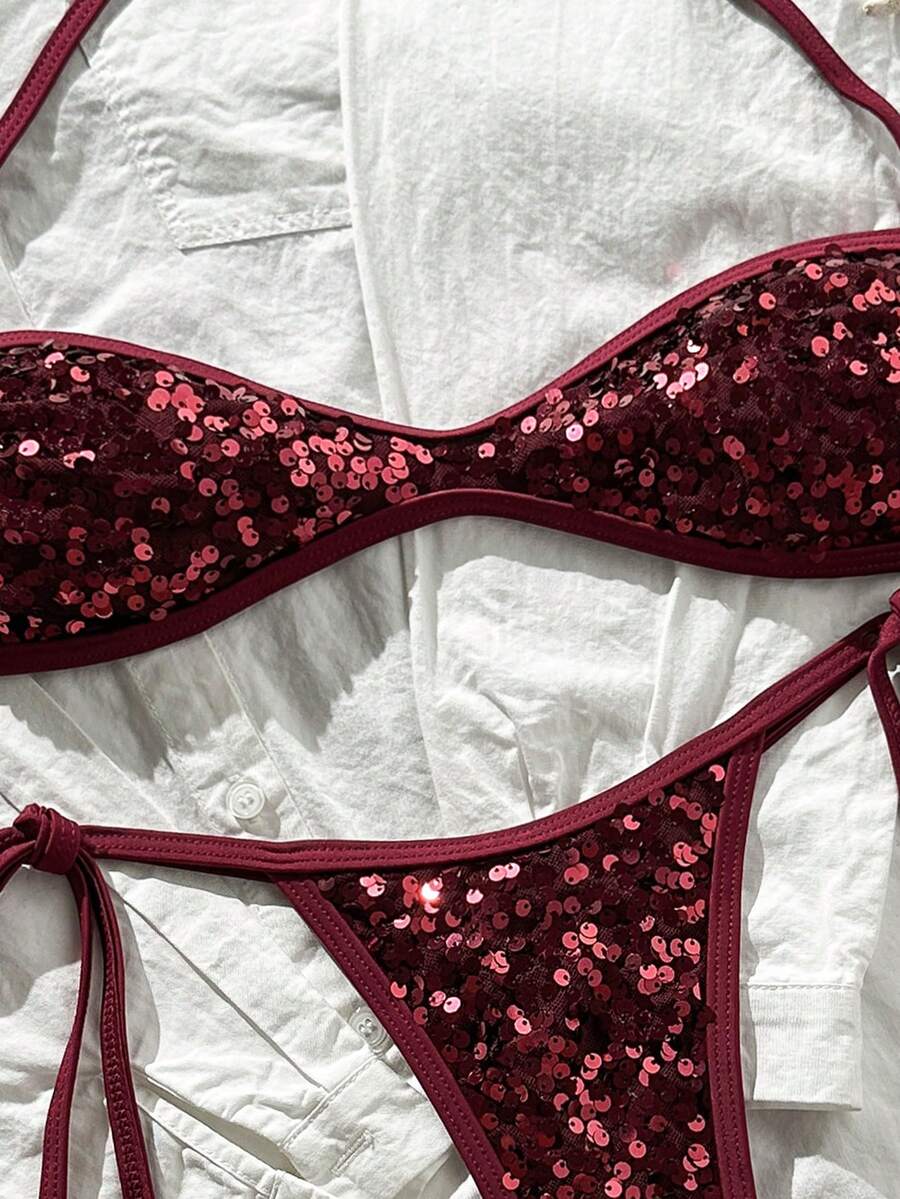 Apricot 2-piece sequin textured halter bikini set featuring a wireless top with lace-up backless ties and matching low-waist side-tie thong bottoms.