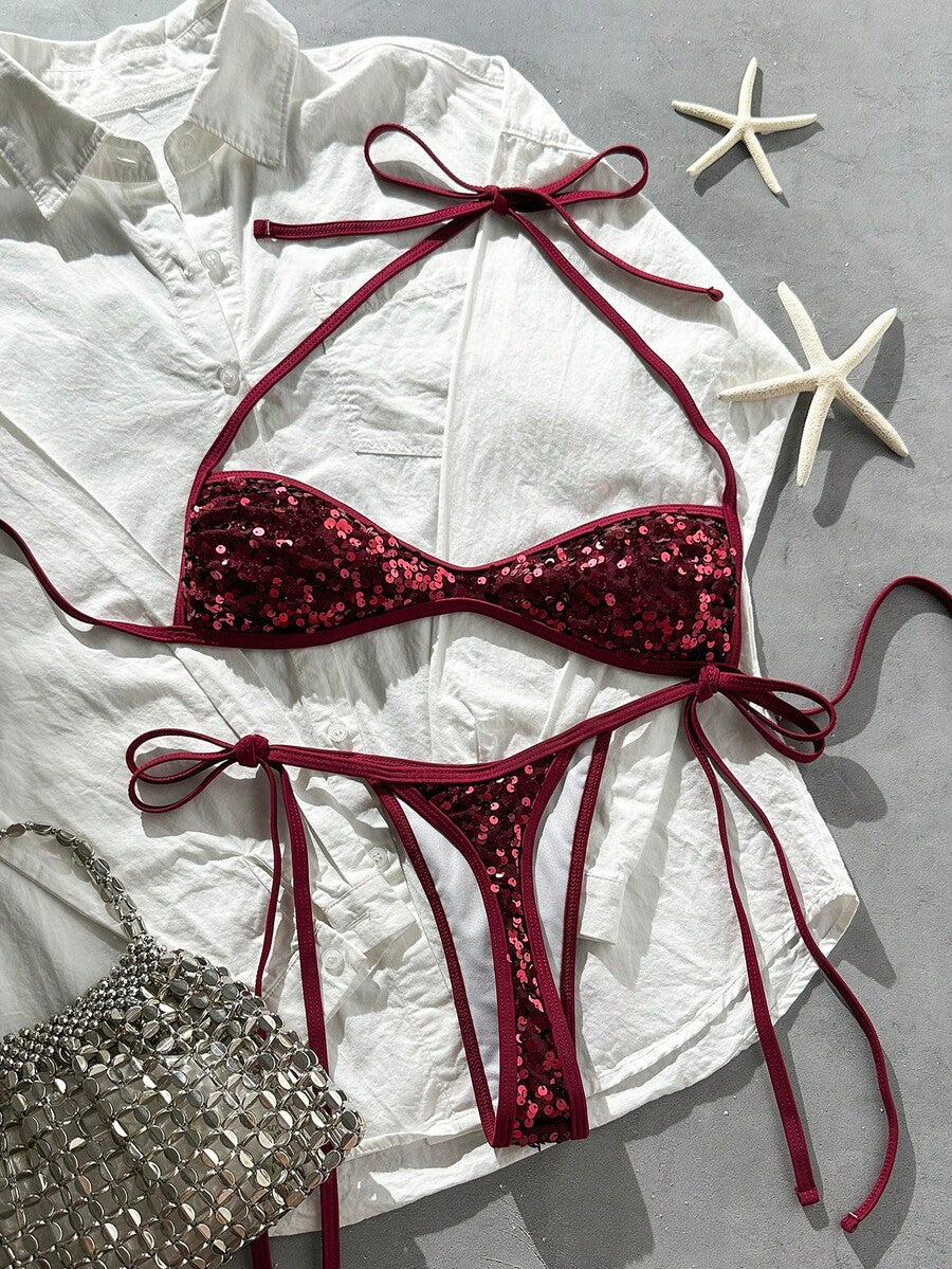 Apricot 2-piece sequin textured halter bikini set featuring a wireless top with lace-up backless ties and matching low-waist side-tie thong bottoms.
