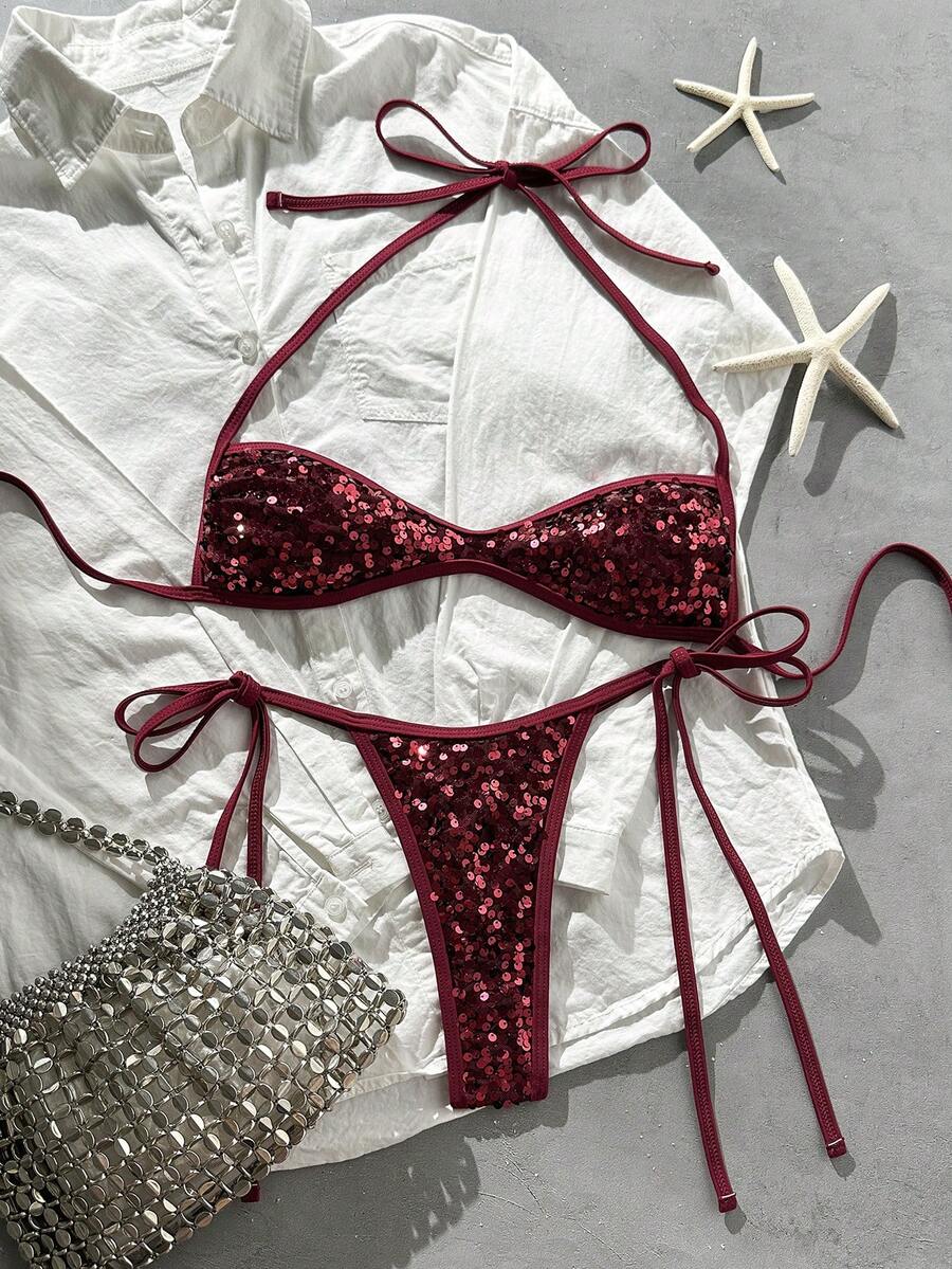 Apricot 2-piece sequin textured halter bikini set featuring a wireless top with lace-up backless ties and matching low-waist side-tie thong bottoms.