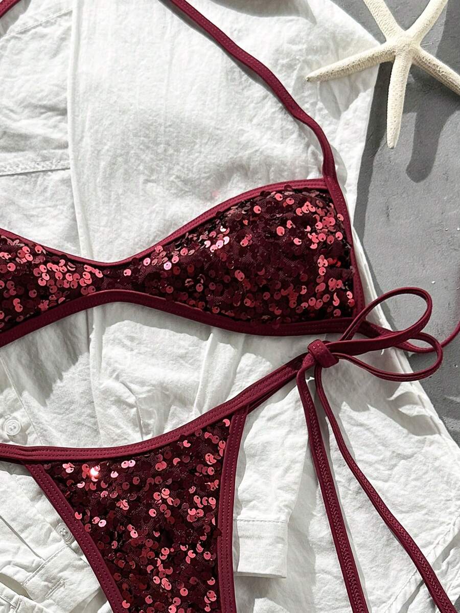 Apricot 2-piece sequin textured halter bikini set featuring a wireless top with lace-up backless ties and matching low-waist side-tie thong bottoms.