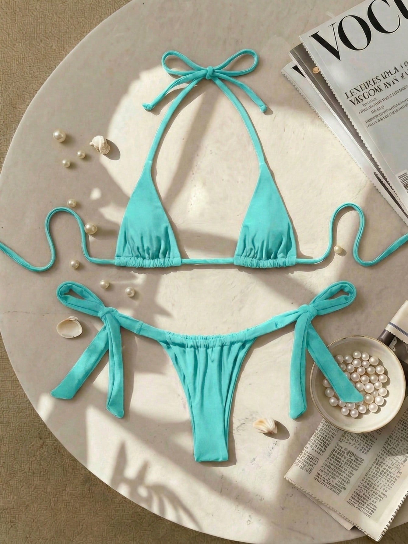 Army green high waist micro bikini swimsuit set for women featuring wireless spaghetti strap top with chain knot details and tie side thong bottoms.