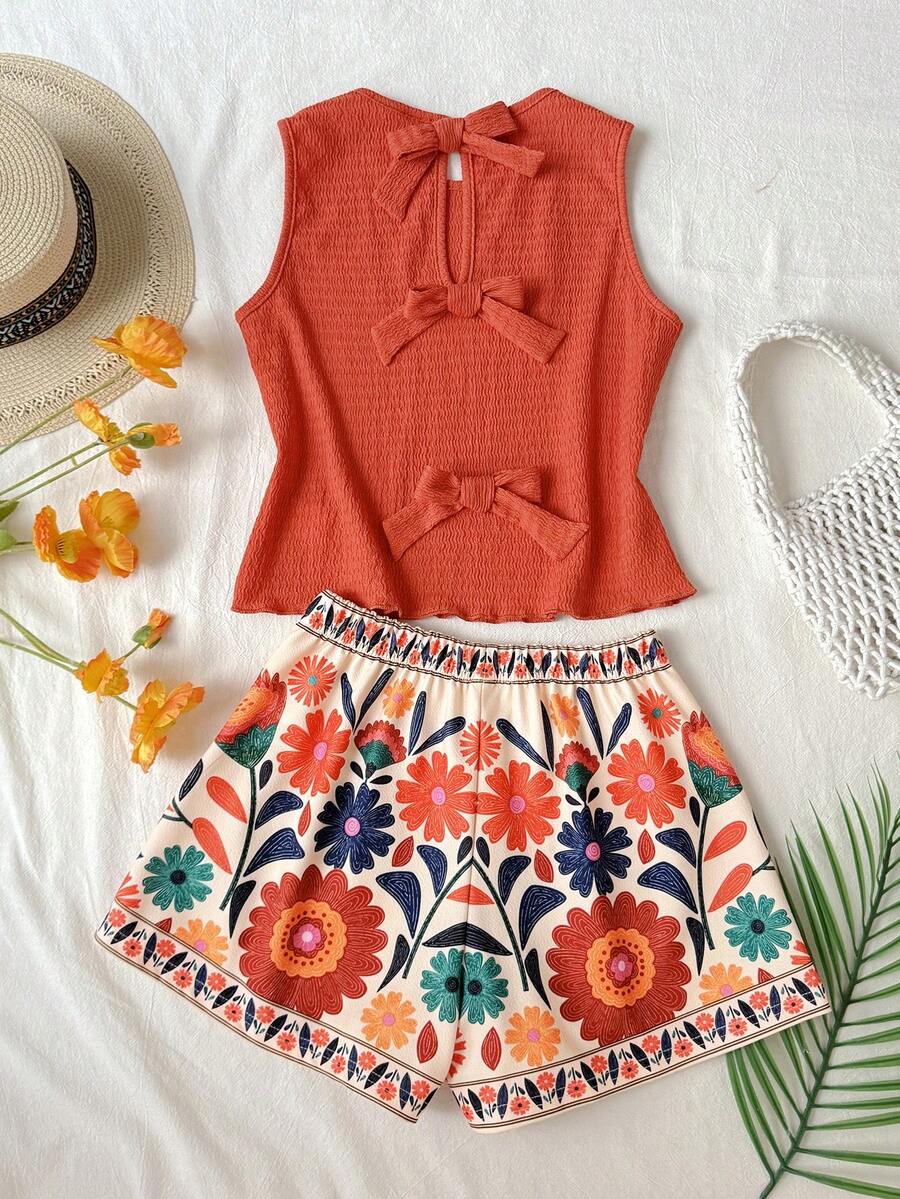 Tween girls casual blue tank top featuring round neck, textured fabric, and bow detail paired with matching shorts set.