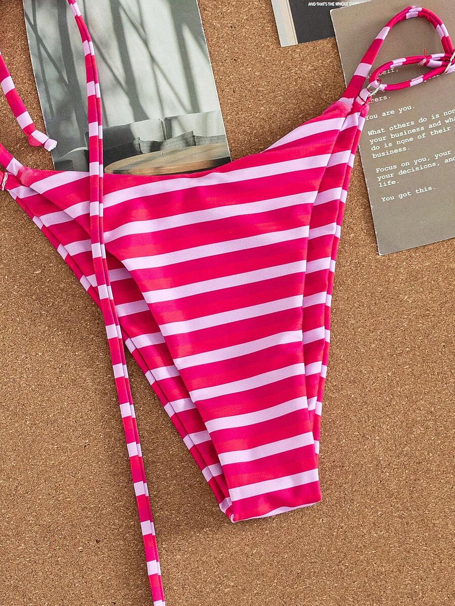Women's printed halter neck tie two-piece swimwear featuring a wireless triangle top with removable padding and high-waist high-cut bikini bottoms.