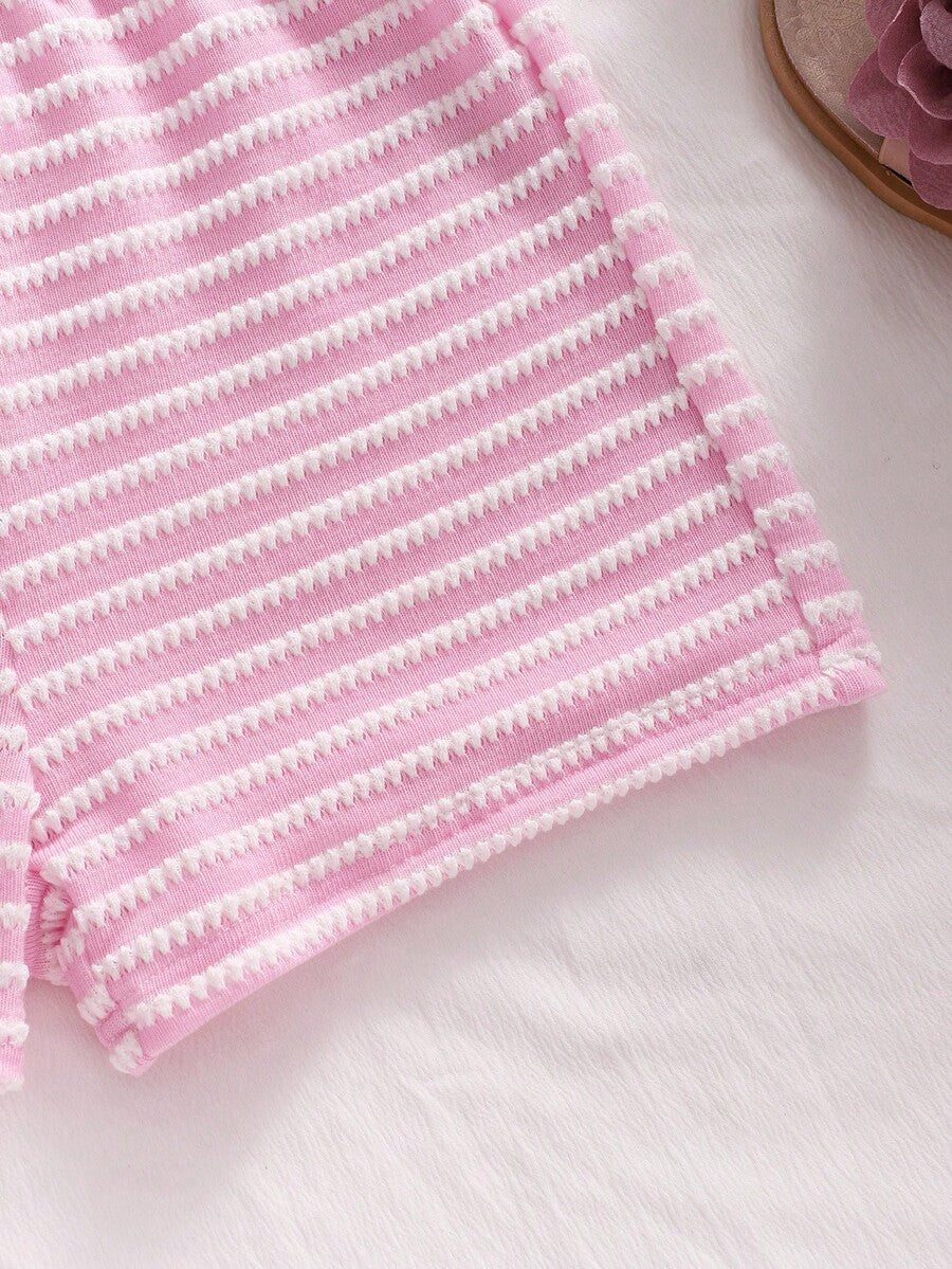 Tween girls black and white striped two-piece set featuring a spaghetti strap micro crop tank top with lettuce trim and ruffle hem paired with matching slim fit shorts.