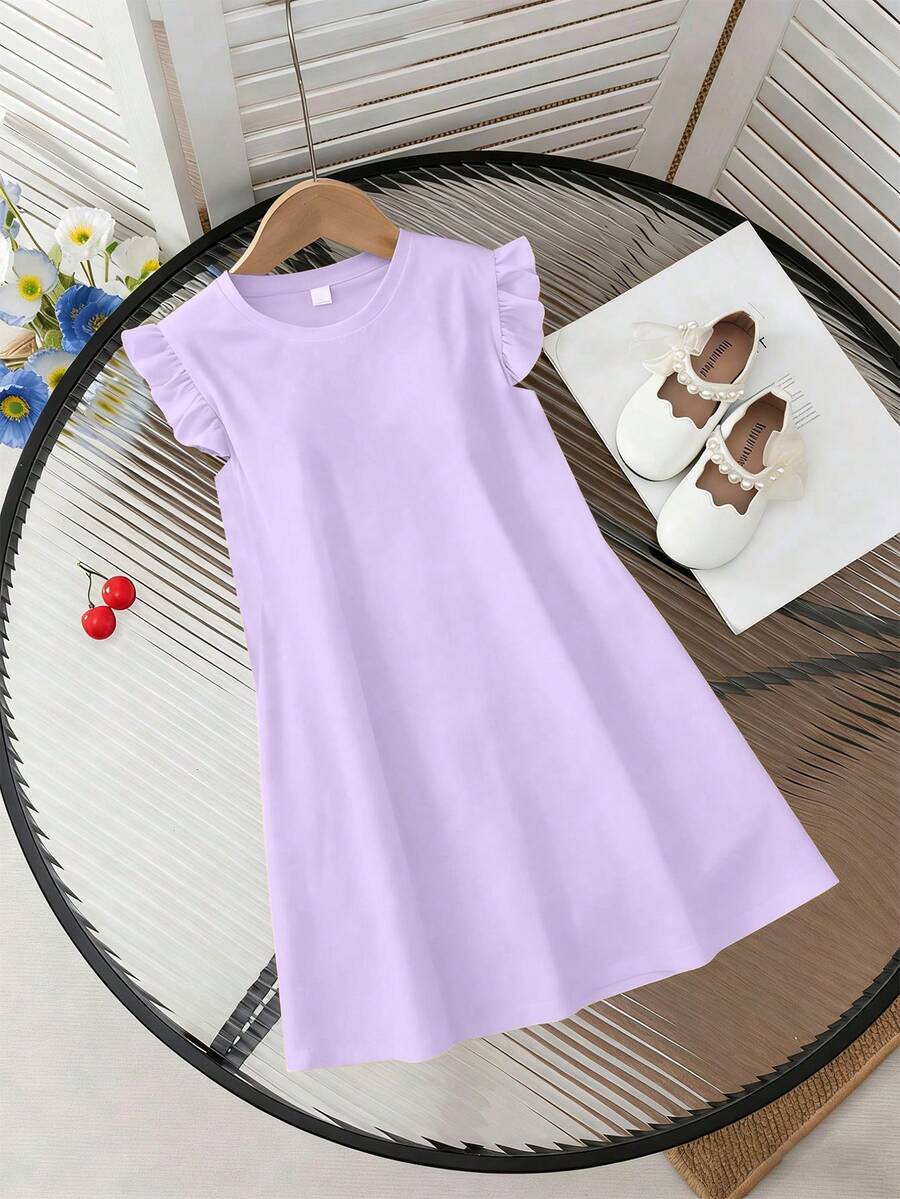 Girls black ruffle sleeve midi dress featuring a loose fit tunic silhouette, round neckline, button details, and short flounce sleeves.