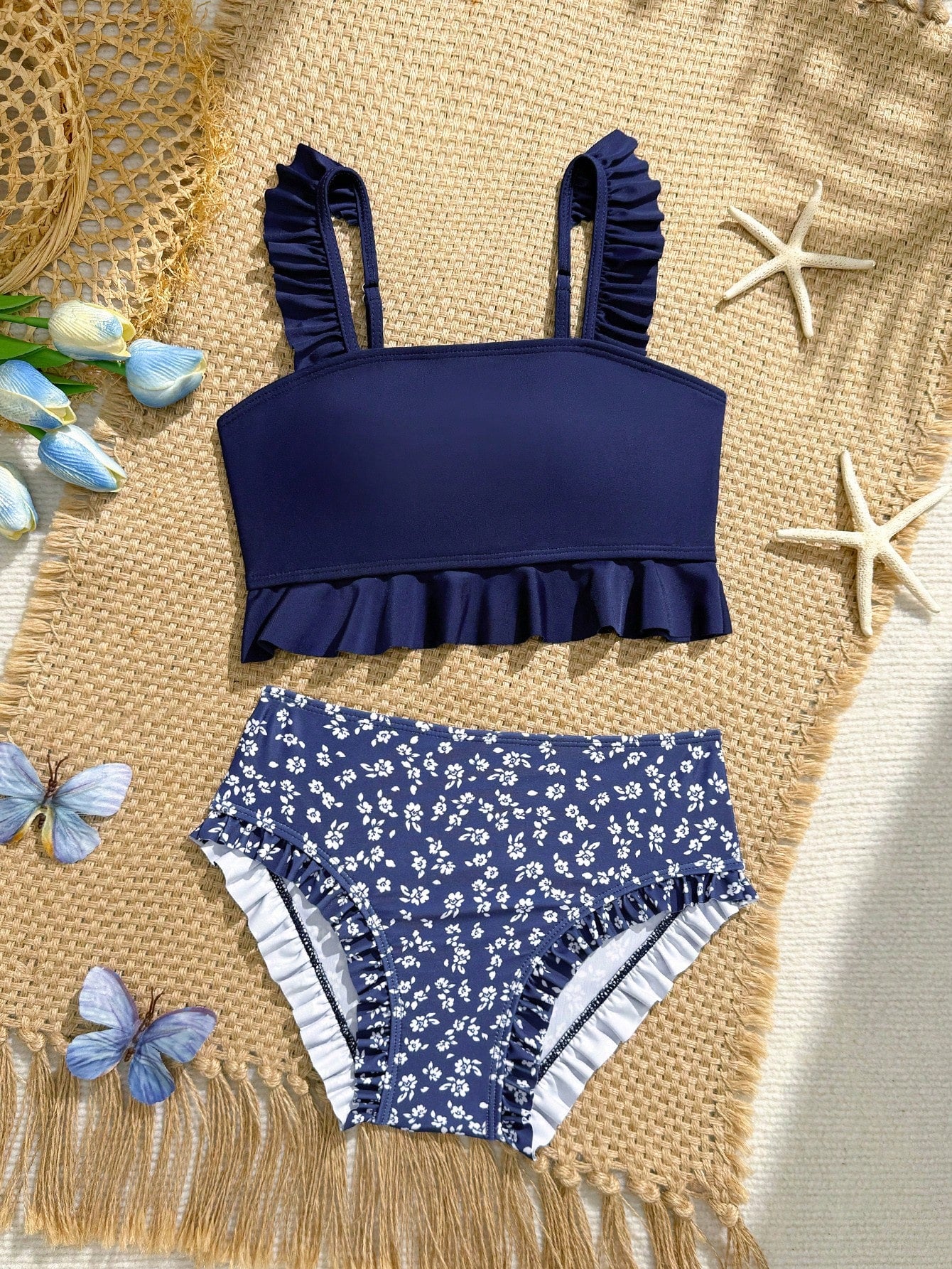 Tween girls solid color 2-piece bikini swimwear set with ruffle detail, strap neckline, wireless bikini top, and triangle mid-waist bikini bottoms; textured pattern with lined bottoms and high-stretch fabric, suitable for summer vacation.
