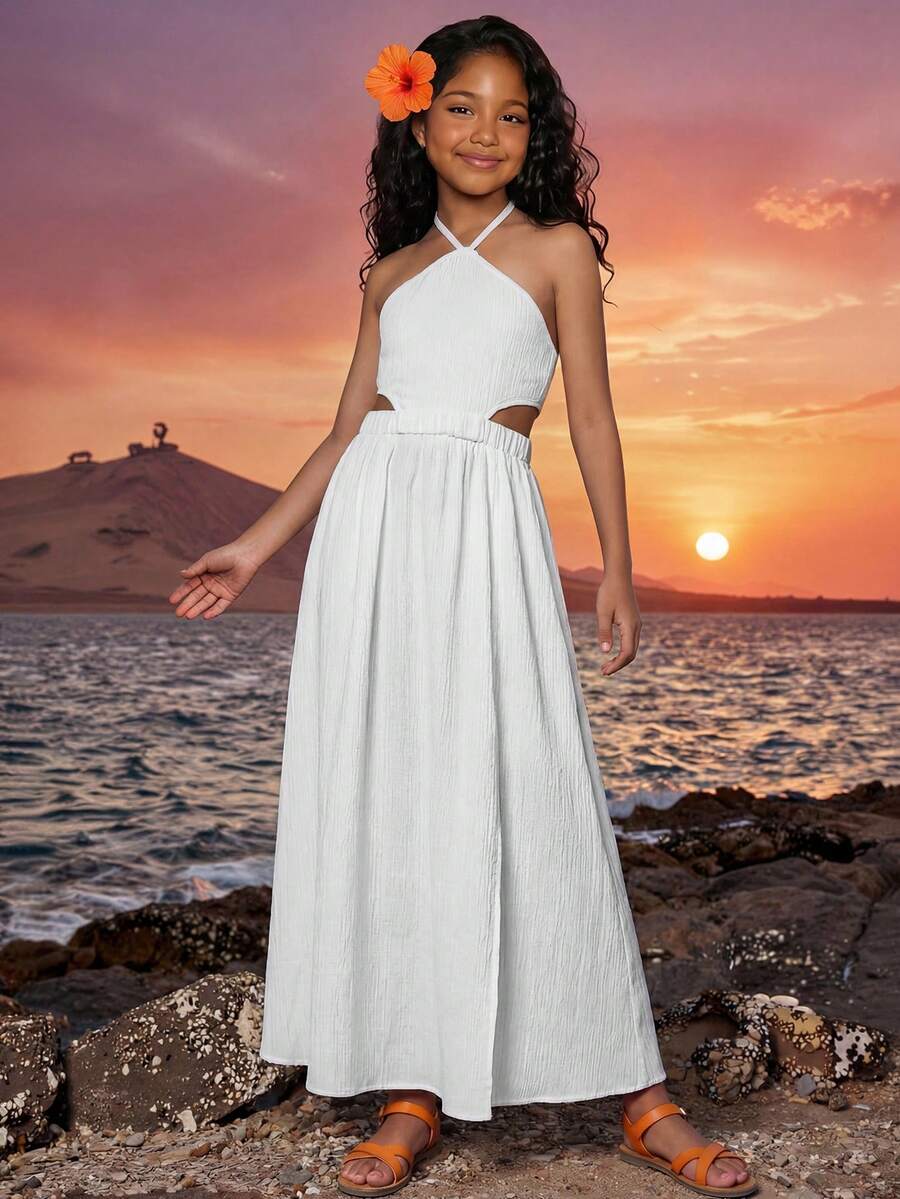 Tween girls floral halter dress with backless sleeveless design, belted high waist, shirred details, appliques, and flared A-line midi silhouette for summer vacation or graduation outfit.