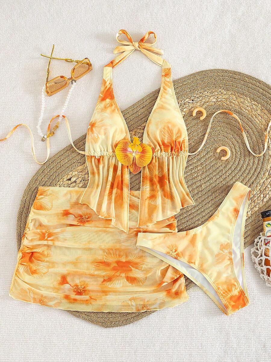 Women's 3-piece floral bikini set featuring a multicolor plant print halter top with 3D rose detail, matching bikini bottoms, and short skirt cover-up
