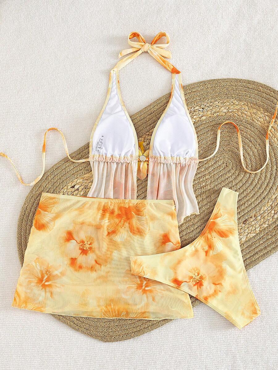 Women's 3-piece floral bikini set featuring a multicolor plant print halter top with 3D rose detail, matching bikini bottoms, and short skirt cover-up