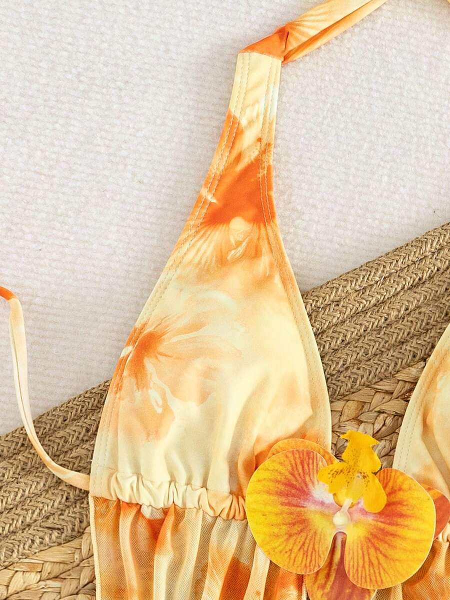 Women's 3-piece floral bikini set featuring a multicolor plant print halter top with 3D rose detail, matching bikini bottoms, and short skirt cover-up