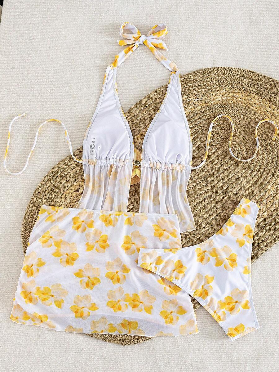 Women's 3-piece floral bikini set featuring a multicolor plant print halter top with 3D rose detail, matching bikini bottoms, and short skirt cover-up
