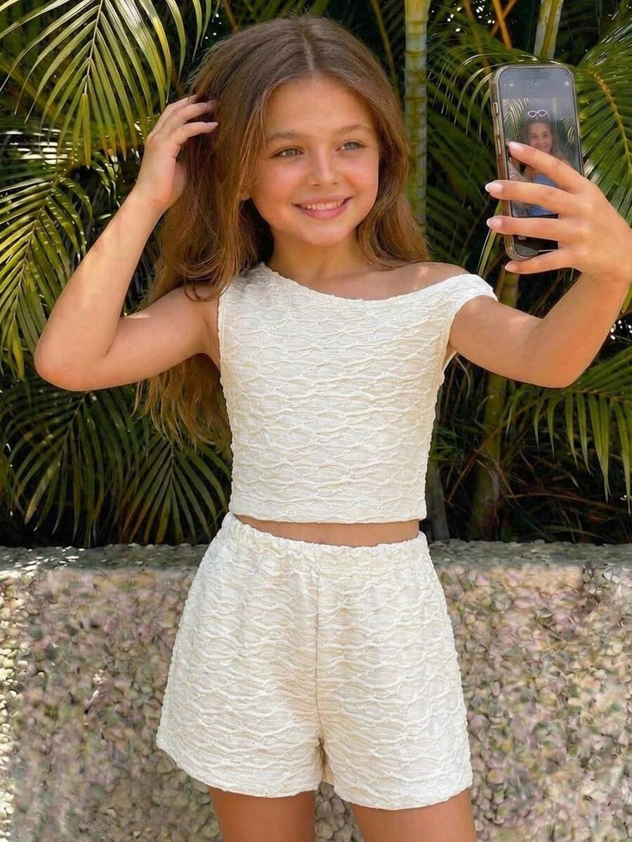 Tween girls army green striped rib-knit two-piece set with asymmetrical neck crop top and matching slim fit shorts.