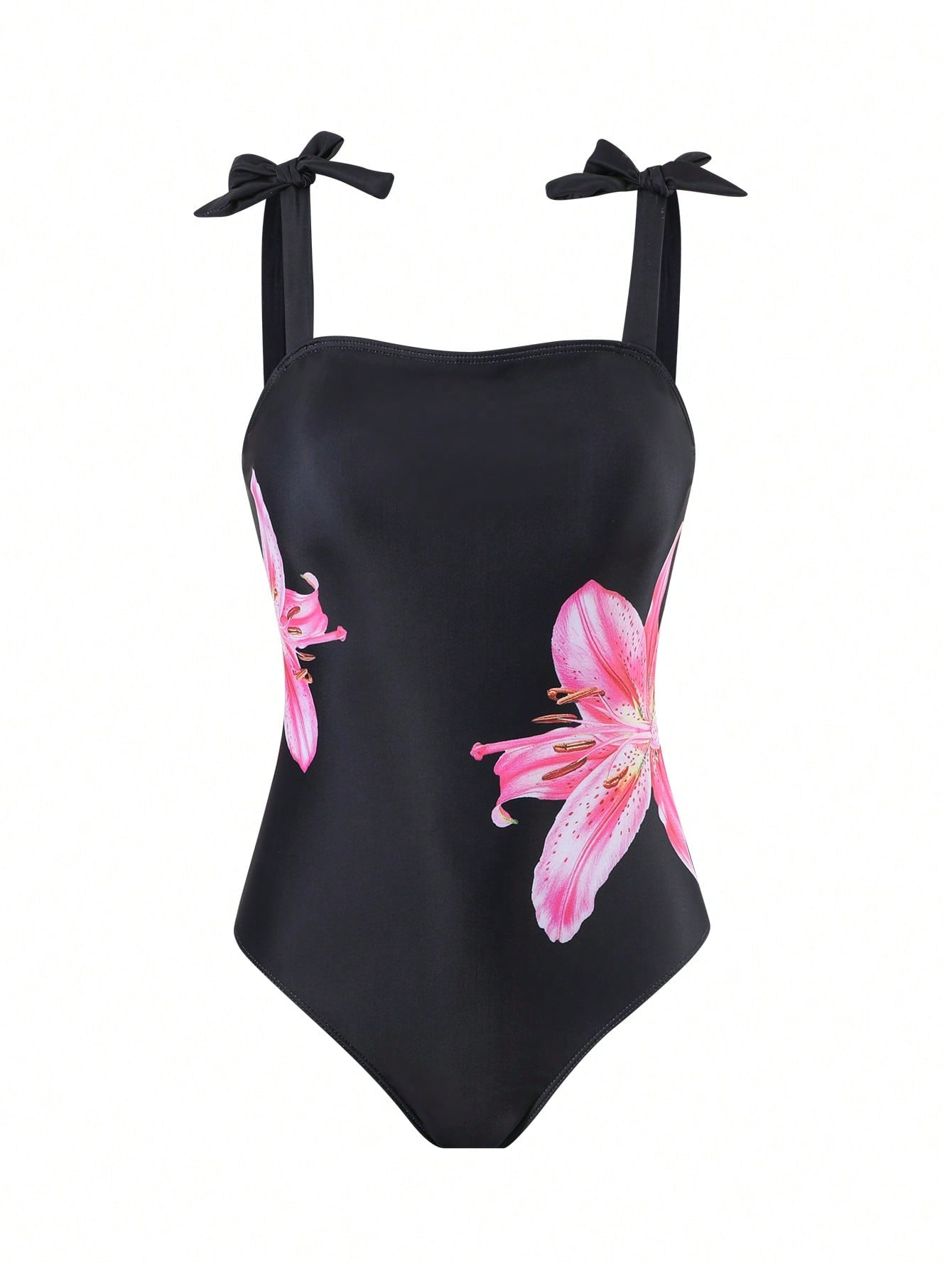 Tween girl black floral one-piece swimsuit set with spaghetti straps, asymmetrical detail, bow decor, and mid-waist bottom for beach, pool, and summer vacation wear.