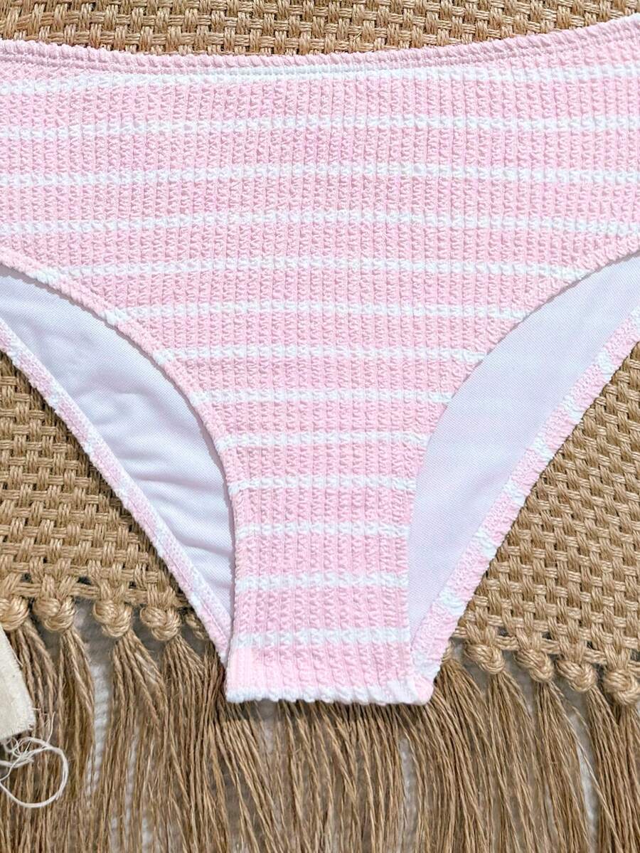 Tween girls pink and white striped two-piece bikini set with spaghetti strap bandeau top, starfish decor, and high waist swim bottoms for beach and vacation wear