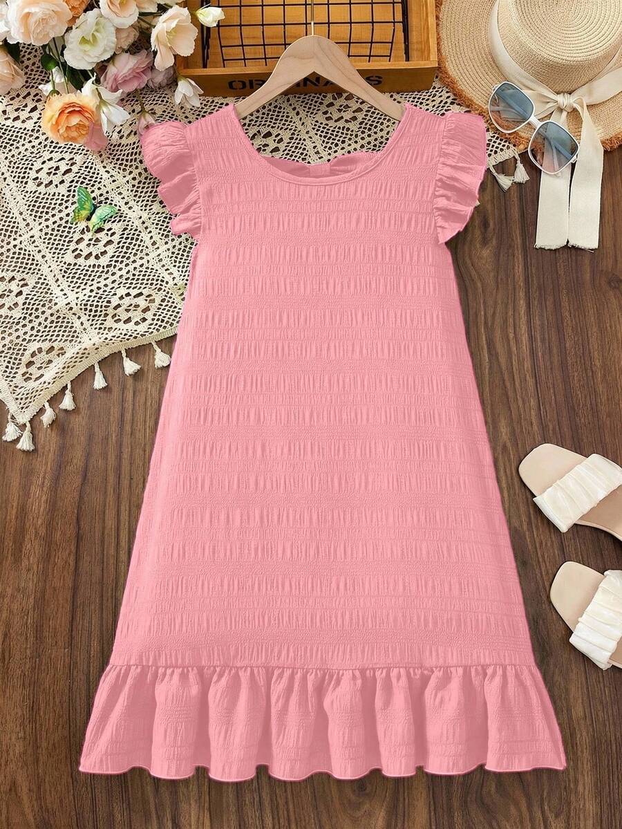 Tween girls apricot vacation midi dress featuring a round neck, cut out details, ruffle flounce accents, and geometric pattern.