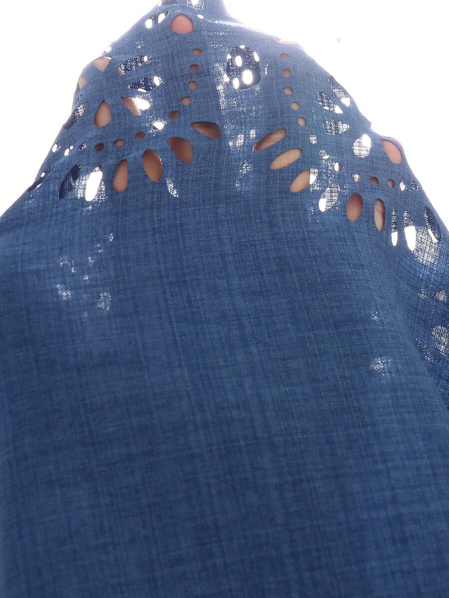 Tween girls blue sleeveless halter A-line mini dress featuring a cutout detail, high waist, flared hem, and zipper closure.