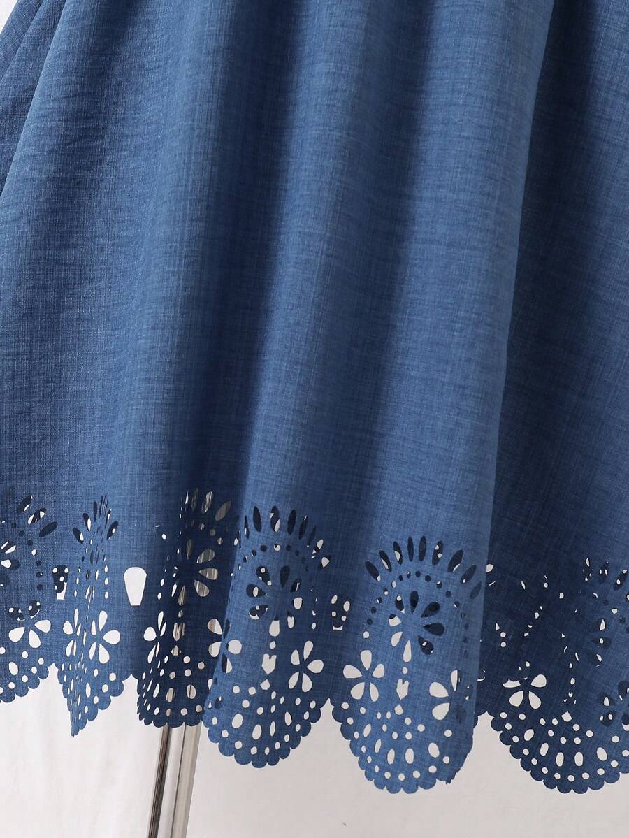 Tween girls blue sleeveless halter A-line mini dress featuring a cutout detail, high waist, flared hem, and zipper closure.
