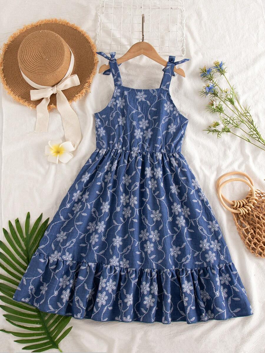 Tween girls blue sleeveless halter A-line mini dress featuring a cutout detail, high waist, flared hem, and zipper closure.