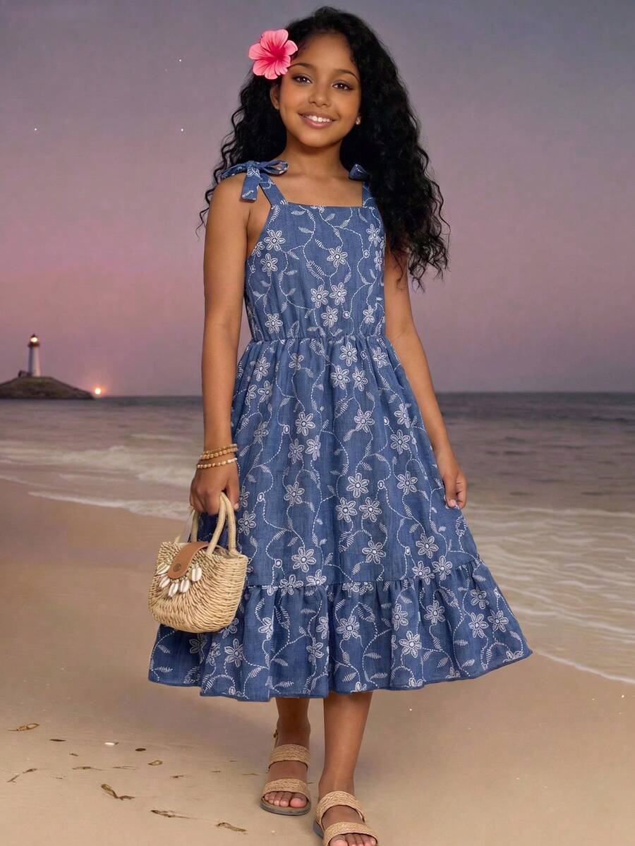 Tween girls blue sleeveless halter A-line mini dress featuring a cutout detail, high waist, flared hem, and zipper closure.