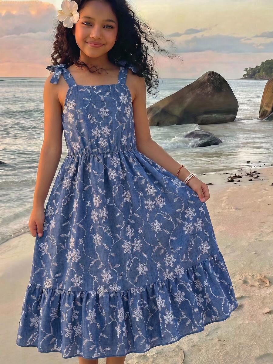 Tween girls blue sleeveless halter A-line mini dress featuring a cutout detail, high waist, flared hem, and zipper closure.