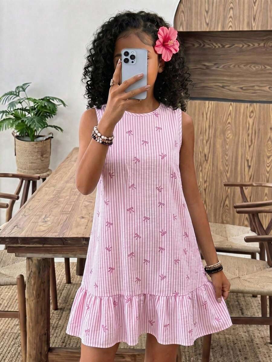 Tween girls casual leopard print smock mini dress featuring a round neck and flounce ruffle hem.