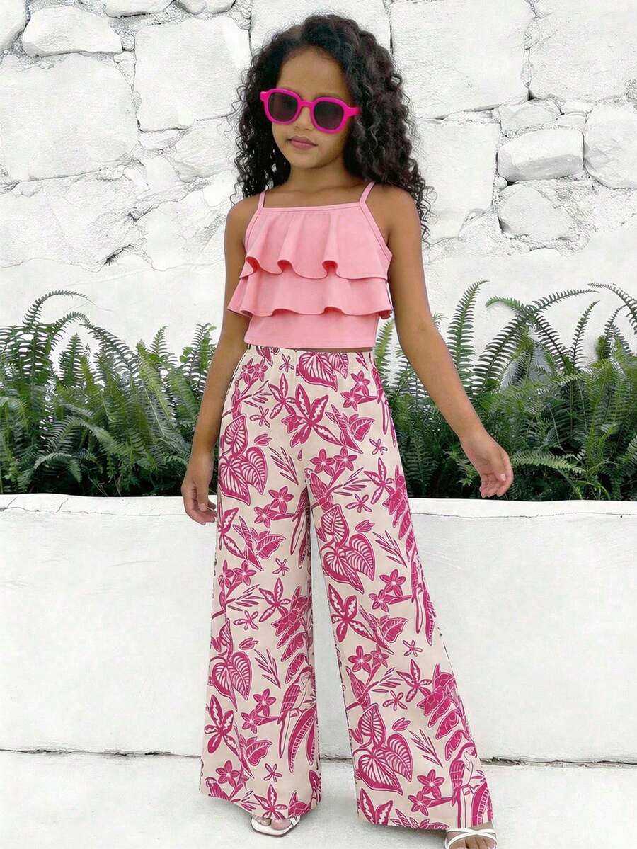 Tween girls blue 2-piece vacation outfit set featuring a tiered ruffle spaghetti strap camisole and loose high-waist pants.