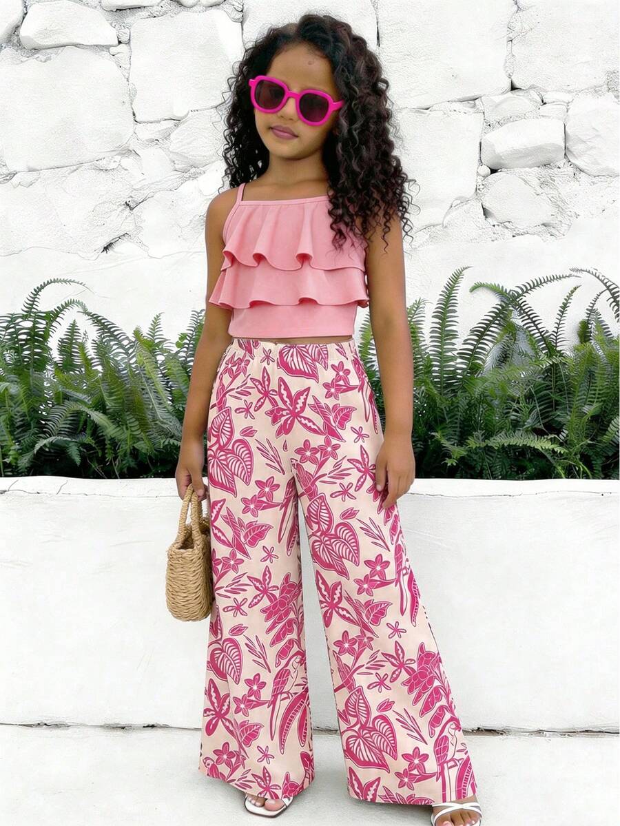 Tween girls blue 2-piece vacation outfit set featuring a tiered ruffle spaghetti strap camisole and loose high-waist pants.