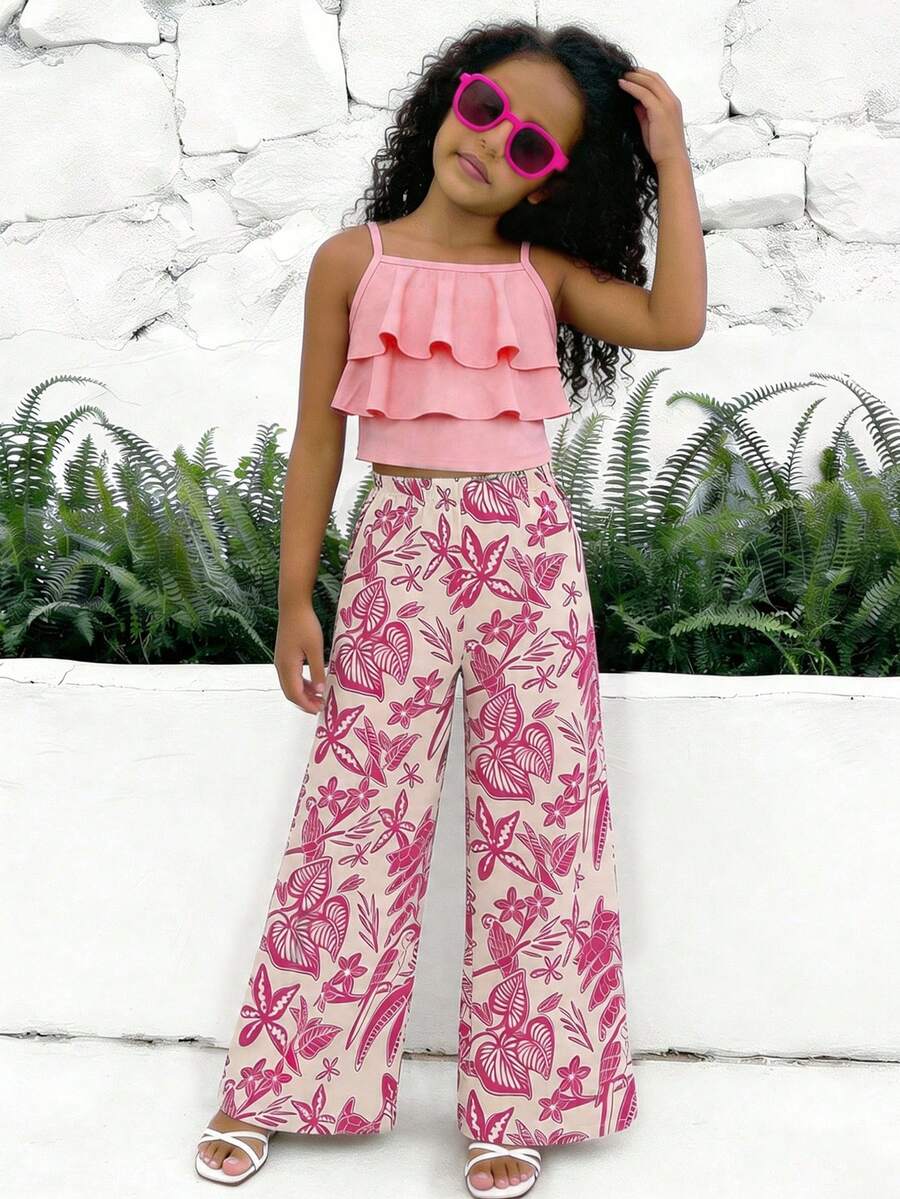 Tween girls blue 2-piece vacation outfit set featuring a tiered ruffle spaghetti strap camisole and loose high-waist pants.