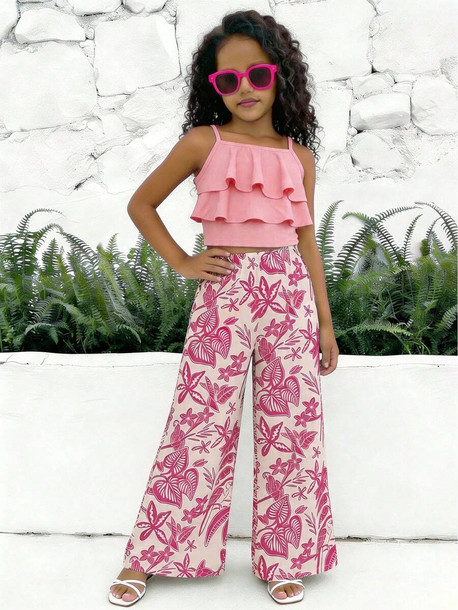 Tween girls blue 2-piece vacation outfit set featuring a tiered ruffle spaghetti strap camisole and loose high-waist pants.