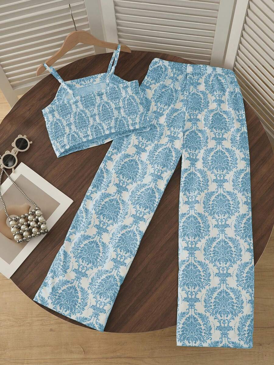 Tween girls casual 2-piece set featuring an apricot woven camisole crop top with back shirring and matching high-waisted loose long pants.