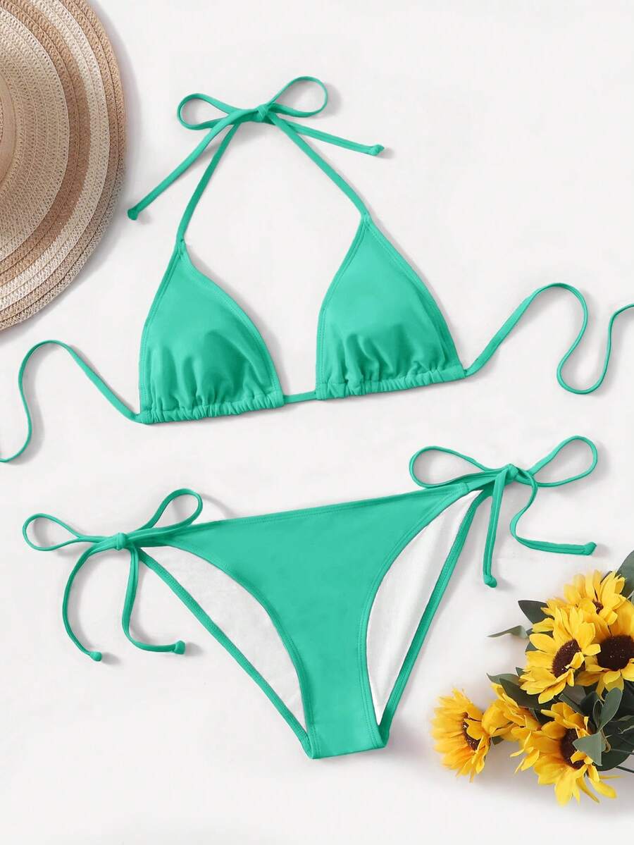 Women's high waist halter tie bikini swimwear set featuring triangle cups, wireless bra with removable padding, and tie side bottoms.