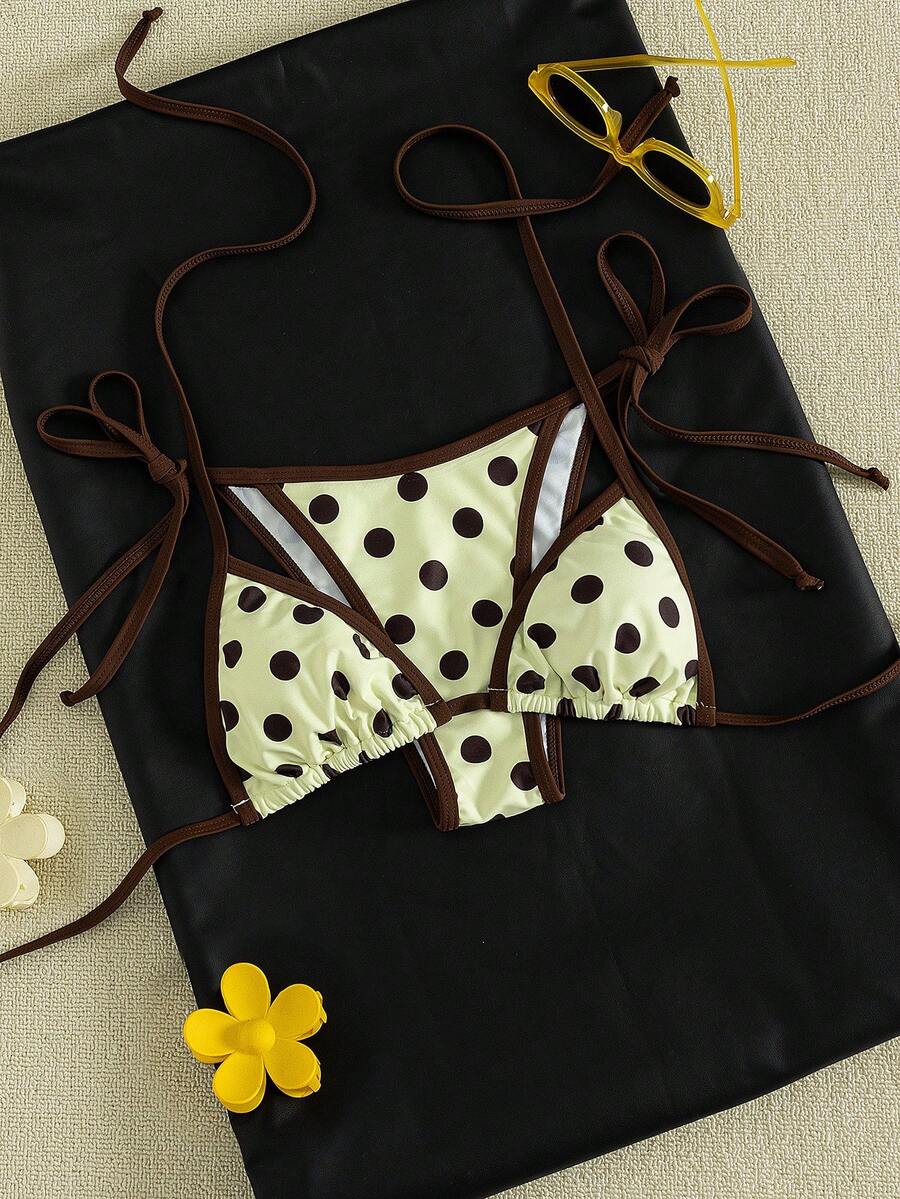 Women's two-piece halter triangle bikini set featuring a backless tie-back top with removable padding and matching tie-side mid-waist bottoms.
